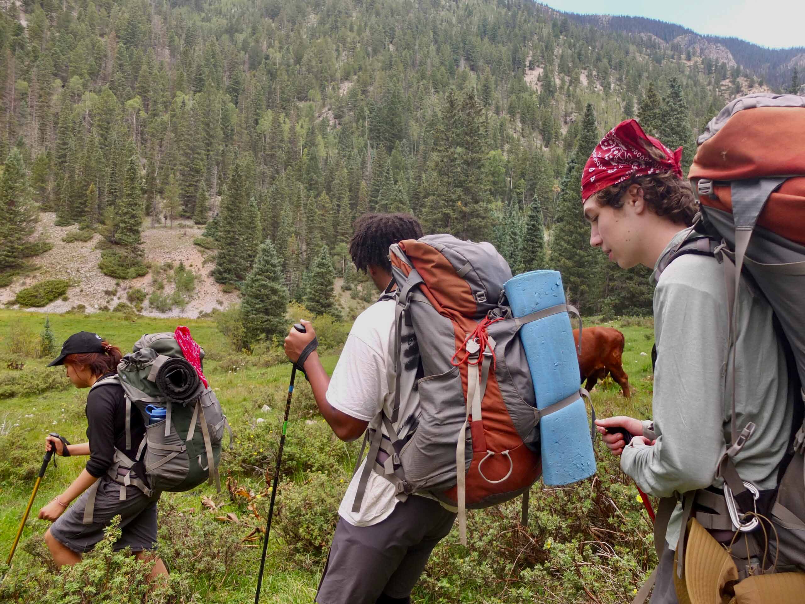 Students hike in the Pecos wilderness as part of the UWC-USA wilderness program.