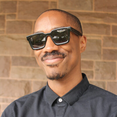 Headshot of CJ Tilley-Solomon