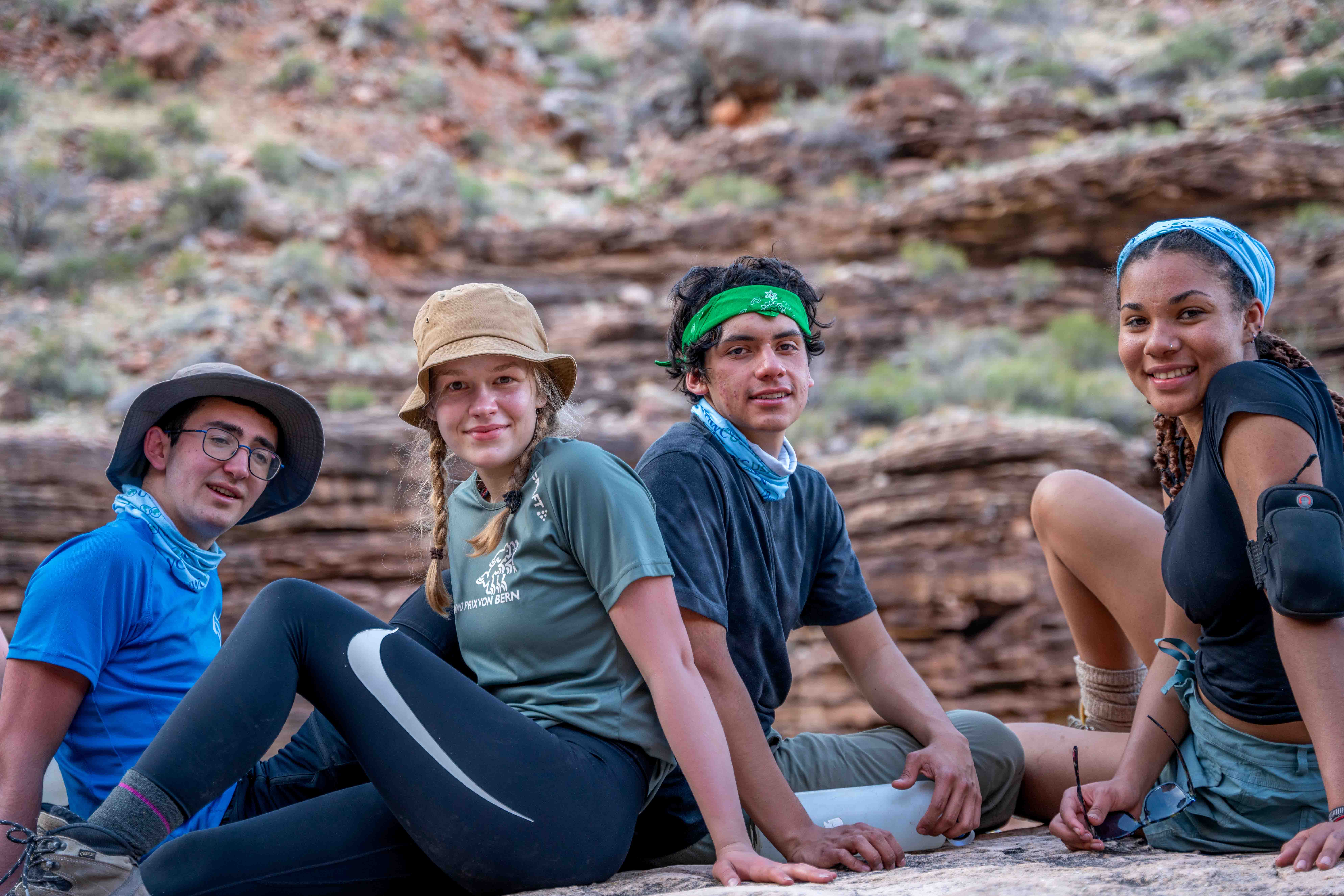 Diverse group of students posing for a picture in the wilderness as part of the wilderness program at UWC-USA.