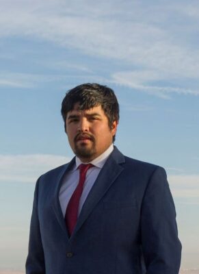 Len Necefer, Native Nations advocate, stands outdoors, reflecting UWC-USA’s commitment to diversity and global citizenship.