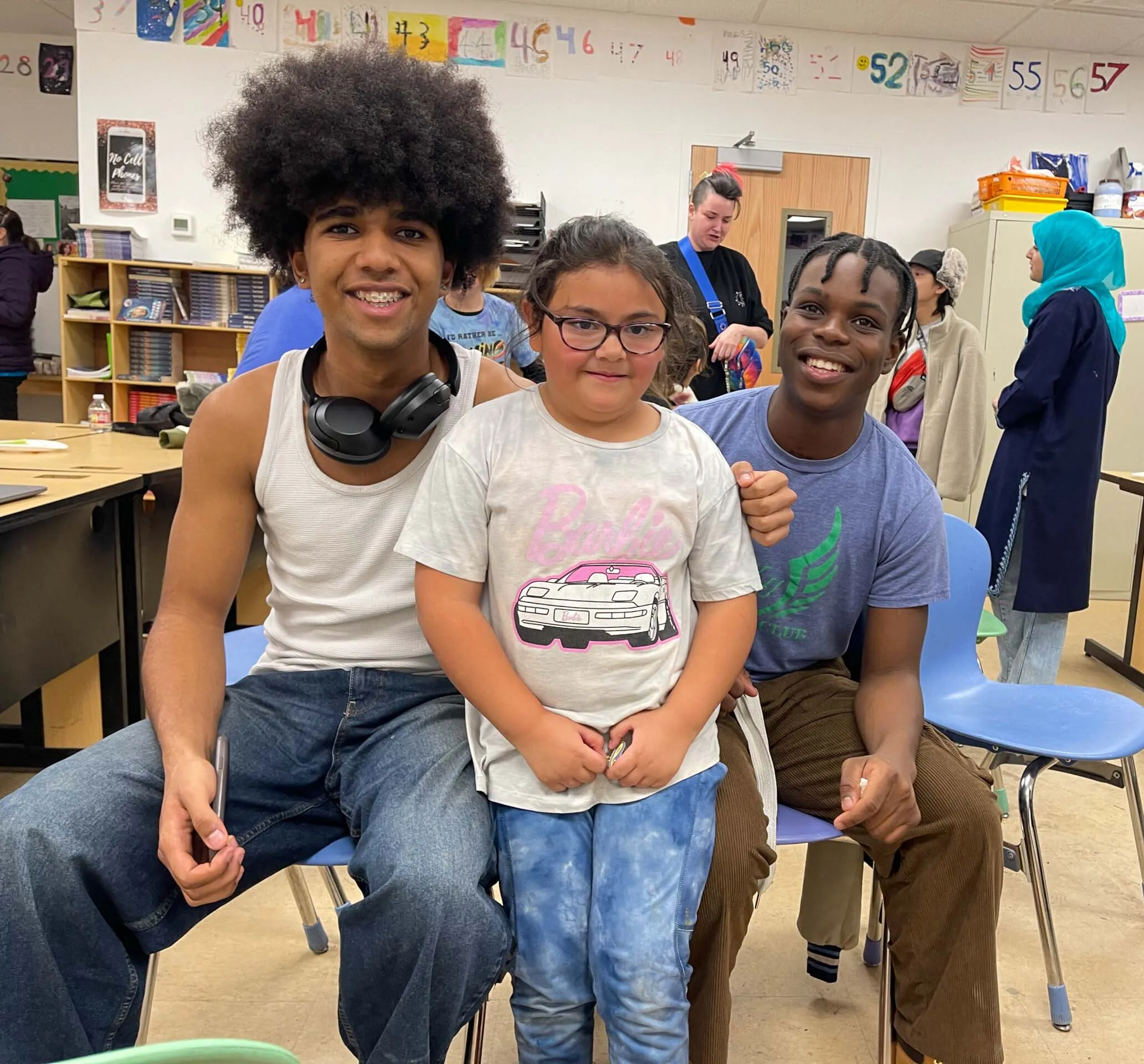 UWC-USA students engage with local school children as part of the Reading Buddies program for community engagement.